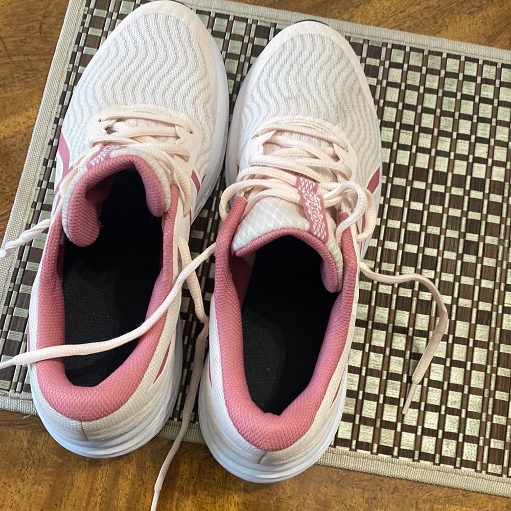 Up for sale are pink shoes 0ASICS size 8.5
